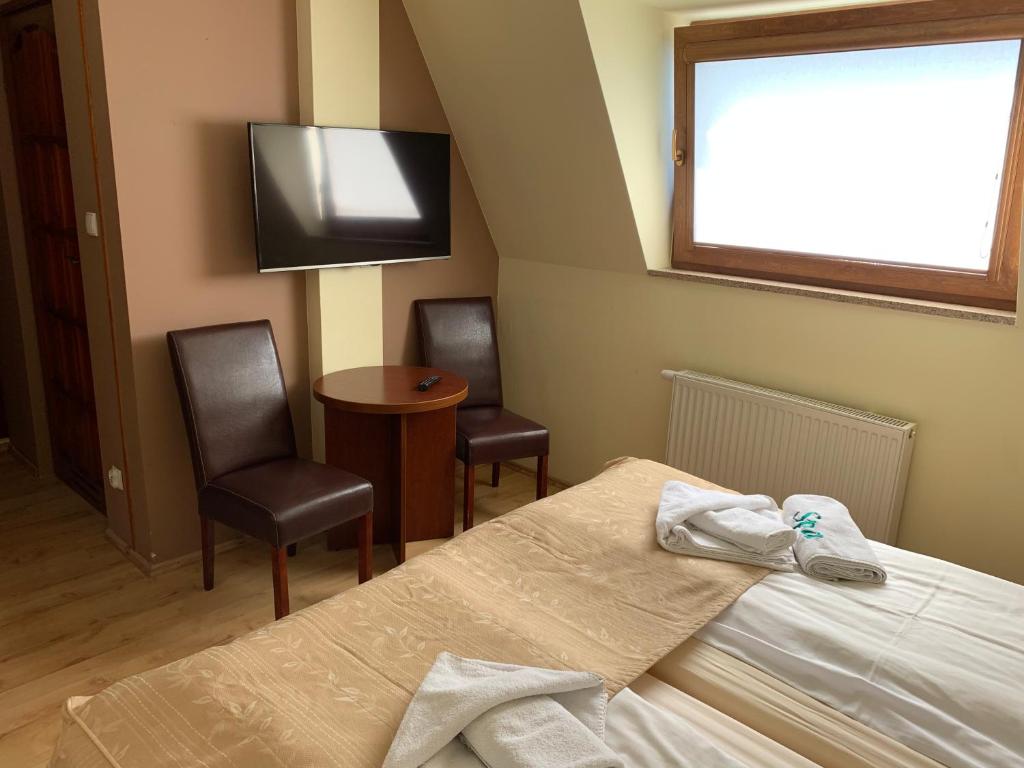 Pokój <span style='color:var(--color-first);'>dwuosobowy</span><br>typu Standard